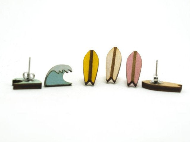 Yellow Surfboard and Wave Studs